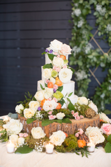 Wedding Cake Covered in Flowers | Legendary Events